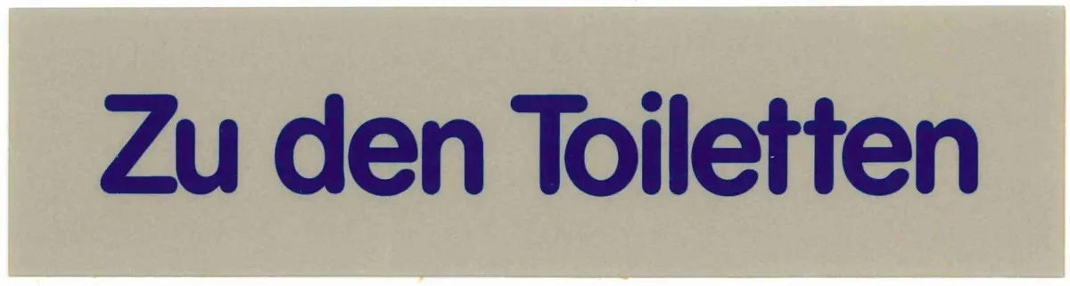 Bild von Schild "Zu den Toiletten"  